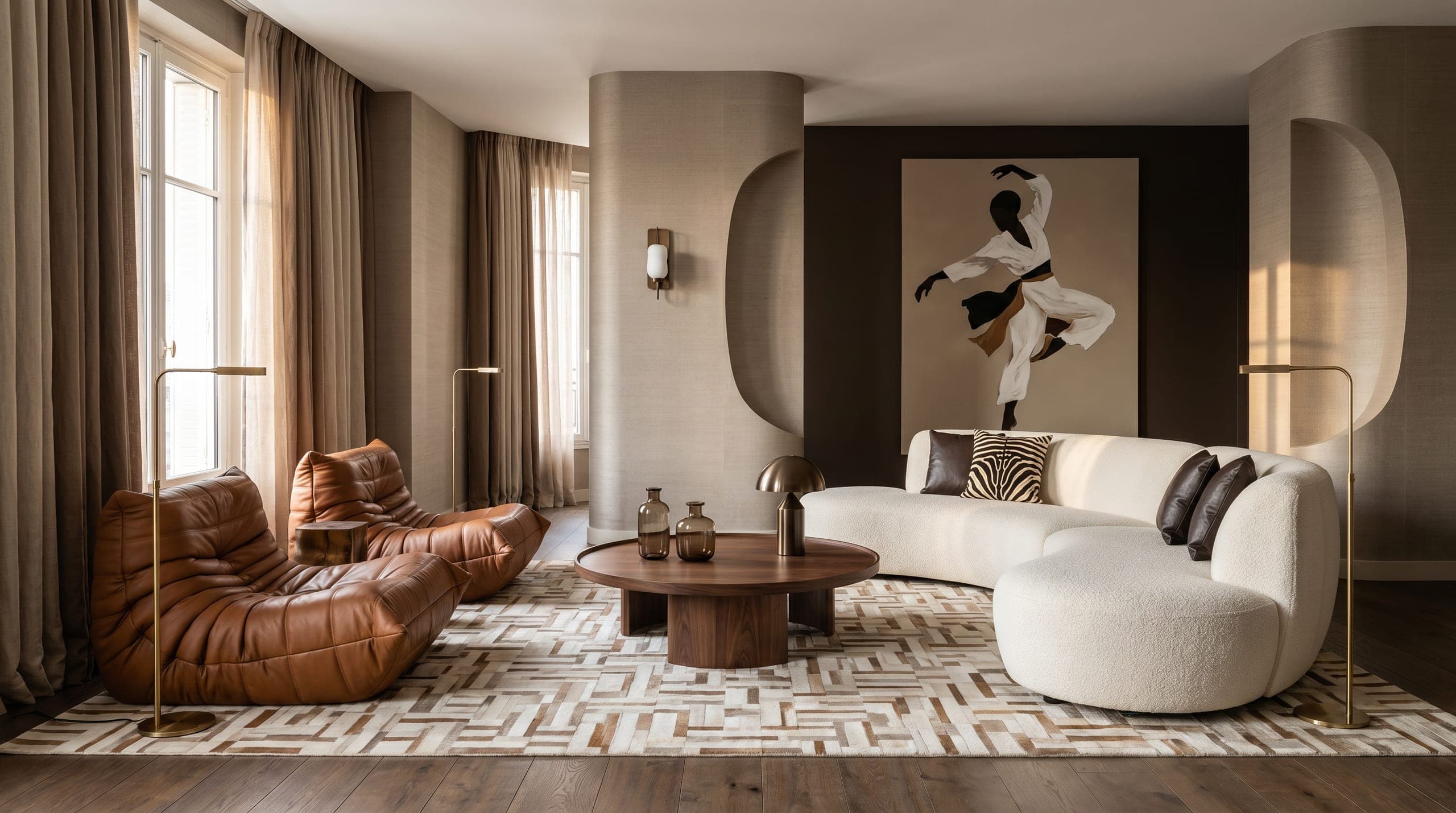 Living room by LKYOOB — tan leather lounge chairs and a curved bouclé sofa around a walnut table below a dancer artwork, warm sheer light